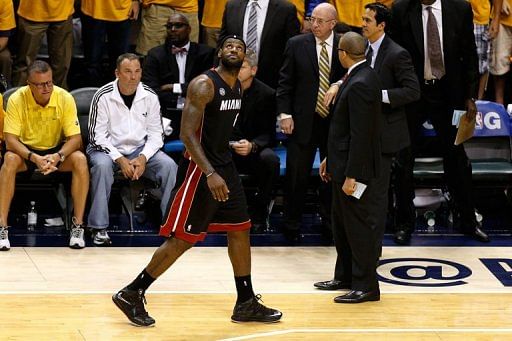 LeBron James of the Miami Heat walks back to the bench after he fouled out on May 28, 2013 in Indianapolis