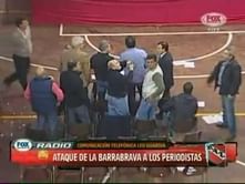 Video: Disgraceful fans throw chairs and tables at Independiente club president