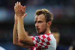 Sevilla midfielder Ivan Rakitic happy being linked to Liverpool