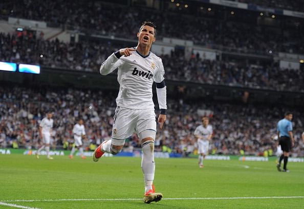 Cristiano Ronaldo of Real Madrid CF celebrates after scoring Real&#039;s 2nd goal during the La Liga match between Real Madrid CF and Malaga CF at estadio Santiago Bernabeu on May 8, 2013 in Madrid, Spain.  (Getty Images)