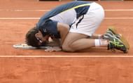 Spain's Tommy Robredo celebrates his victory over Spain's Nicolas Almagro at the end of their French Tennis Open round of sixteen match at the Roland Garros stadium in Paris, on June 2, 2013.