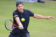 Tommy Haas of Germany plays a forehand in his match against Ernests Gulbis of Latvia during day four of the Gerry Weber Open at Gerry Weber Stadium on June 13, 2013 in Halle, Germany. (Photo by Thomas Starke/Bongarts/Getty Images)