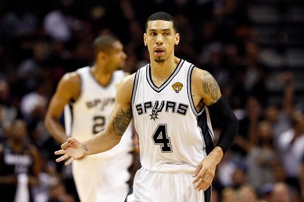 Danny Green #4 of the San Antonio Spurs reacts after making a three-pointer in the third quarter against the Miami Heat during Game Five of the 2013 NBA Finals at the AT&amp;T Center on June 16, 2013 in San Antonio, Texas.  (Getty Images)