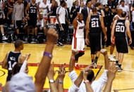 Dwyane Wade #3 of the Miami Heat celebrates after the Heat defeat the San Antonio Spurs 103-100 in overtime during Game Six of the 2013 NBA Finals at AmericanAirlines Arena on June 18, 2013 in Miami, Florida. (Getty images)