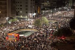 One killed as more than a million protest in Brazil