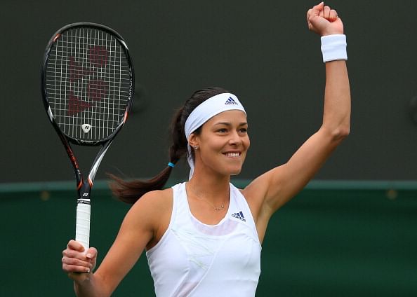  Ana Ivanovic of Serbia celebrates a point during her Women&#039;s Singles match against Virginie Razzano of France on day one of the Wimbledon Lawn Tennis Championships at the All England Lawn Tennis and Croquet Club on June 24, 2013 in London, England.  (Getty Images)