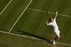 Tennis: Murray takes cover as Wimbledon faces washout