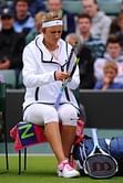 Injured Azarenka blasts Wimbledon courts