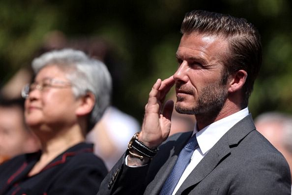 Football: Beckham shines amid China gloom on the pitch