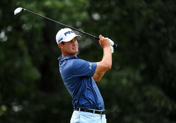 Late birdies lift English to St. Jude victory