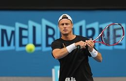 Tennis: Rain halts play at Queen's