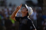 Justin Rose of England looks to the heavens in acknowledgement of his deceased father after putting on the 18th hole to complete the final round of the 113th U.S. Open at Merion Golf Club on June 16, 2013 in Ardmore, Pennsylvania. (Photo by Ross Kinnaird/Getty Images)