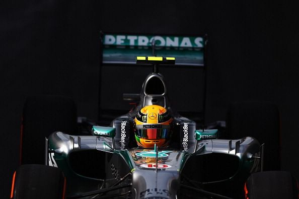 Hamilton takes pole as Mercedes lock out front row