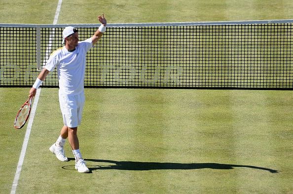 Hewitt stuns del Potro to reach Queen's semis