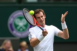 History-maker Murray into second round