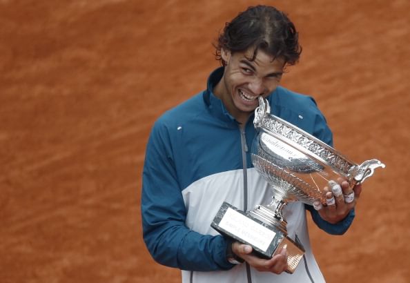 Nadal buries Ferrer to etch French Open history