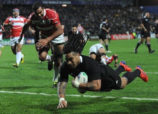 All Blacks&#039; Ma&#039;a Nonu scores a try during their Rugby World Cup match vs Japan, in Hamilton, on September 16, 2011