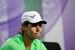 Hobbled Nadal clings onto Wimbledon dream