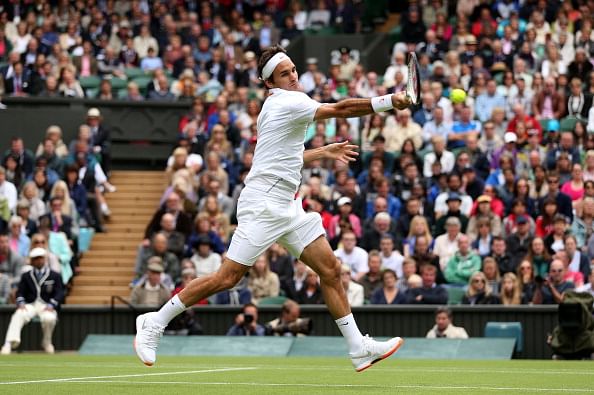 Federer storms into Wimbledon second round