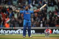 Shikhar Dhawan of Indian celebrates scoring his century during the ICC Champions Trophy Group B match between India and West Indies at The Oval on June 11, 2013 in London, England. (Photo by Christopher Lee-ICC/ICC via Getty Images)