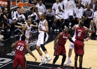 Tim Duncan #21 of the San Antonio Spurs dunks the ball against Udonis Haslem #40 of the Miami Heat in the first quarter during Game Three of the 2013 NBA Finals at the AT&T Center on June 11, 2013 in San Antonio, Texas. (Getty Images)