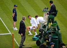 Tsonga out of Wimbledon with knee injury