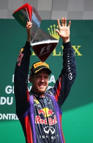 Sebastian Vettel of Red Bull Racing celebrates on the podium after winning the Canadian Formula One Grand Prix at the Circuit Gilles Villeneuve on June 9, 2013 in Montreal, Canada. (Getty Images)