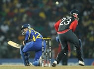 Tillakaratne Dilshan (L) plays a scoop shot over the head of England wicketkeeper Matt Prior (R) during the Cricket World Cup 2011 quarter-final at The R. Premadasa Cricket Stadium in Colombo on March 26, 2011. At the batsmen have got more innovate, as have the bowlers with the slower bouncer and yoker.(Getty Images)