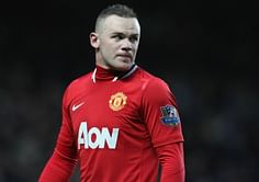 Mike Phelan urges Rooney to stay at Manchester United