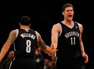 Brook Lopez #11 and Deron Williams #8 along with KG, Pierce and Joe Johnson will make up the starting five for the Nets. (Getty Images)