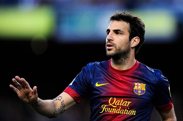 Satire: Manchester United give Barcelona a call for Cesc Fabregas