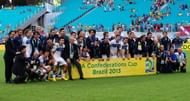Italy's national football team poses for pictures after defeating Uruguay 3-2 in the penalty shoot-out of their FIFA Confederations Cup Brazil 2013 third-place football match, at the Fonte Nova Arena in Salvador, on June 30, 2013. (Getty Images)