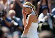 Sabine Lisicki of Germany cries during a post-match interview with Sue Barker on Centre Court after her Ladies' Singles final match against Marion Bartoli of France on day twelve of the Wimbledon Lawn Tennis Championships at the All England Lawn Tennis and Croquet Club on July 6, 2013 in London, England. (Getty Images)