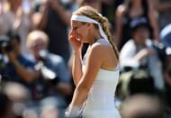 Sabine Lisicki of Germany cries during a post-match interview with Sue Barker on Centre Court after her Ladies' Singles final match against Marion Bartoli of France on day twelve of the Wimbledon Lawn Tennis Championships at the All England Lawn Tennis and Croquet Club on July 6, 2013 in London, England. (Getty Images)