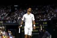 Djokovic reacts during the Gentlemen's Singles Final against Murray at the All England Club on July 7, 2013 in London, England. (Getty Images)