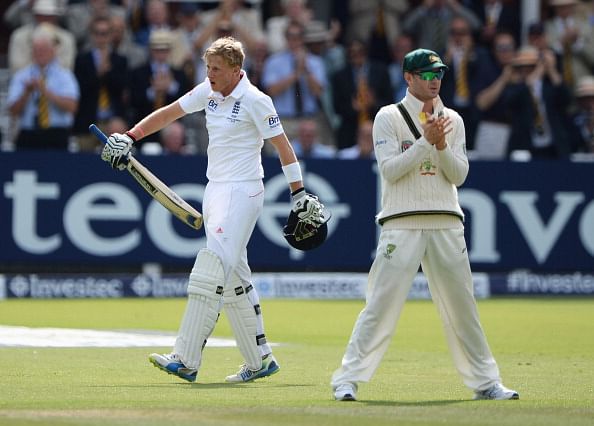 oe Root of England celebrates his century as Michael Clarke of Australia applauds during day three of the 2nd Ashes Test  at Lord&#039;s Cricket Ground on July 20, 2013 in London, England.  (Getty Images)