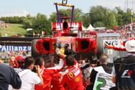 Ferrari mechanics recover the car of Felipe Massa of Brazil and Ferrari following his accident during qualifying for the Hungarian Formula One Grand Prix at the Hungaroring on July 25, 2009 in Budapest, Hungary. (Getty Images)