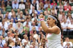 Bartoli sweeps past Flipkens to enter Wimbledon finals
