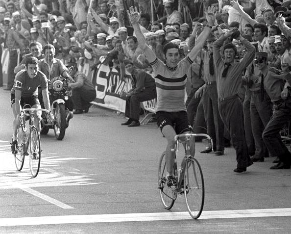 Eddy Merckx raises his arms in celebration as he crosses the line to win the World Professional 168 mile road Championship race