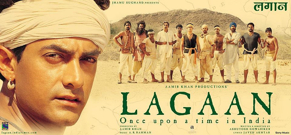 A cinema-goer looks at a poster of the film &quot;Lagaa