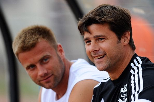 Manager Mauricio Pochettino (R) and Artur Boruc of Southampton looks on during a friendly match between Southampton FC and UE Llagostera at the Josep Pla i Arbones Stadium on July 17, 2013 in Girona, Spain.  (Getty Images)