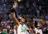 Boston Celtics' Paul Pierce celebrates with his MVP trophy after winning Game 6 of the 2008 NBA Finals in Boston, Massachusetts, June 17, 2008. The Boston Celtics captured the National Basketball Association championship, routing the Los Angeles Lakers 131-92 to win the best-of-seven NBA Finals four games to two.