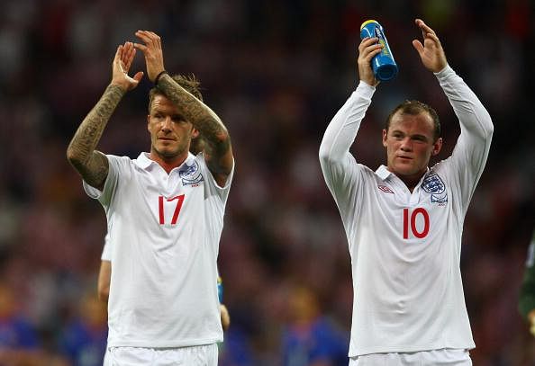David Beckham urges Wayne Rooney to stay with Manchester United