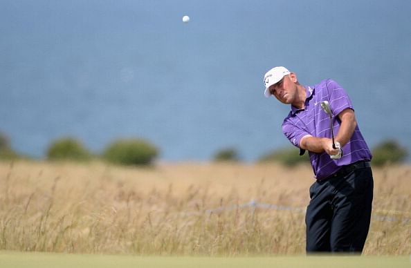Thomas Bjorn breaks camera with a shot