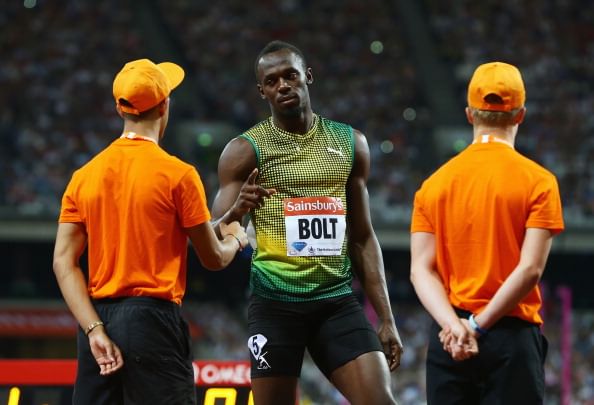 Bolt recovers from a slow start to win in London