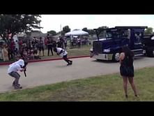 Video: 'World's strongest man' Mark Henry pulls a semi-trailer truck