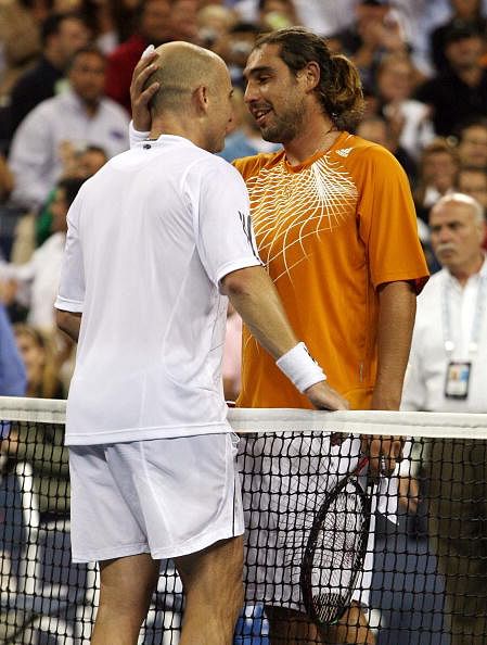 Marcos Baghdatis, right, of Cyprus congratulates Andre Agass