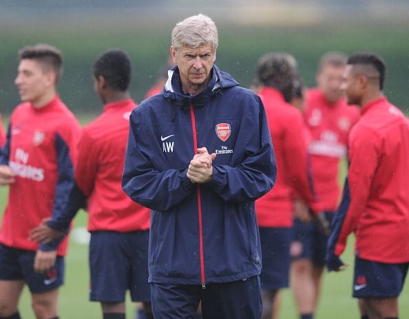 Arsene Wenger admits Liverpool unlikely to let Luis Suarez leave
