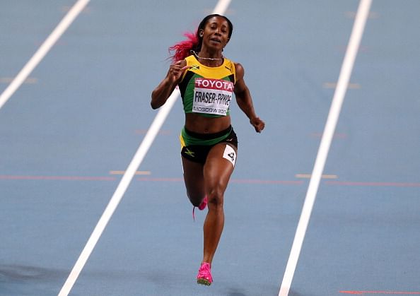 Shelly-Ann Fraser-Pryce makes history, wins sprint double at IAAF World Championships