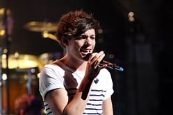 Music band One Direction's singer Louis Tomlinson signs for Doncaster Rovers